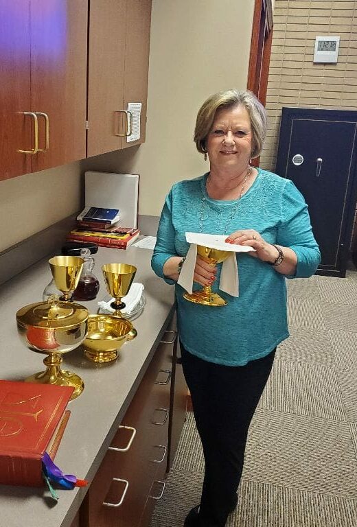 getting ready for mass in the sacristy at mary our queen